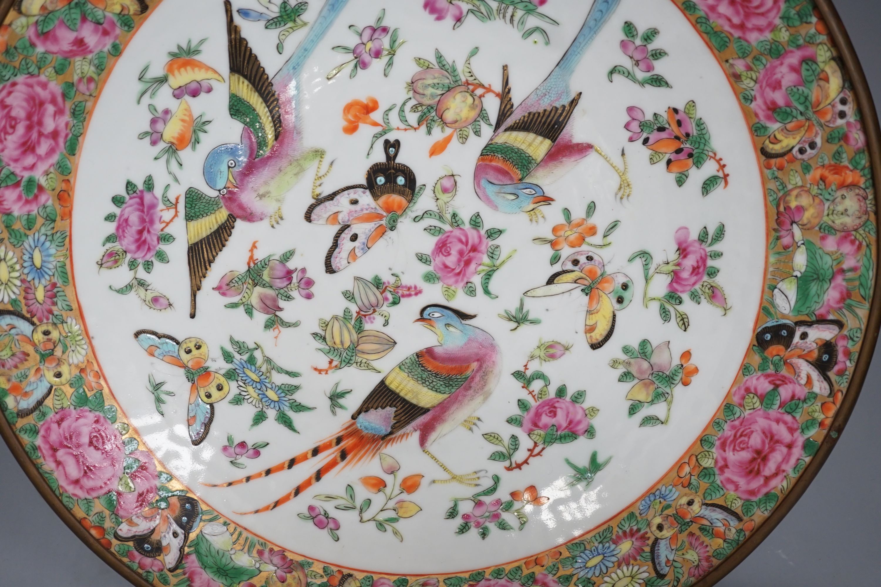 A 19th century Chinese famille rose ‘birds insects fruit and flowers’ dish - 35cm diameter